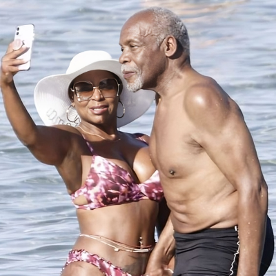 Picture taken by paparazzi of Danny and Regina enjoying their time in the ocean.